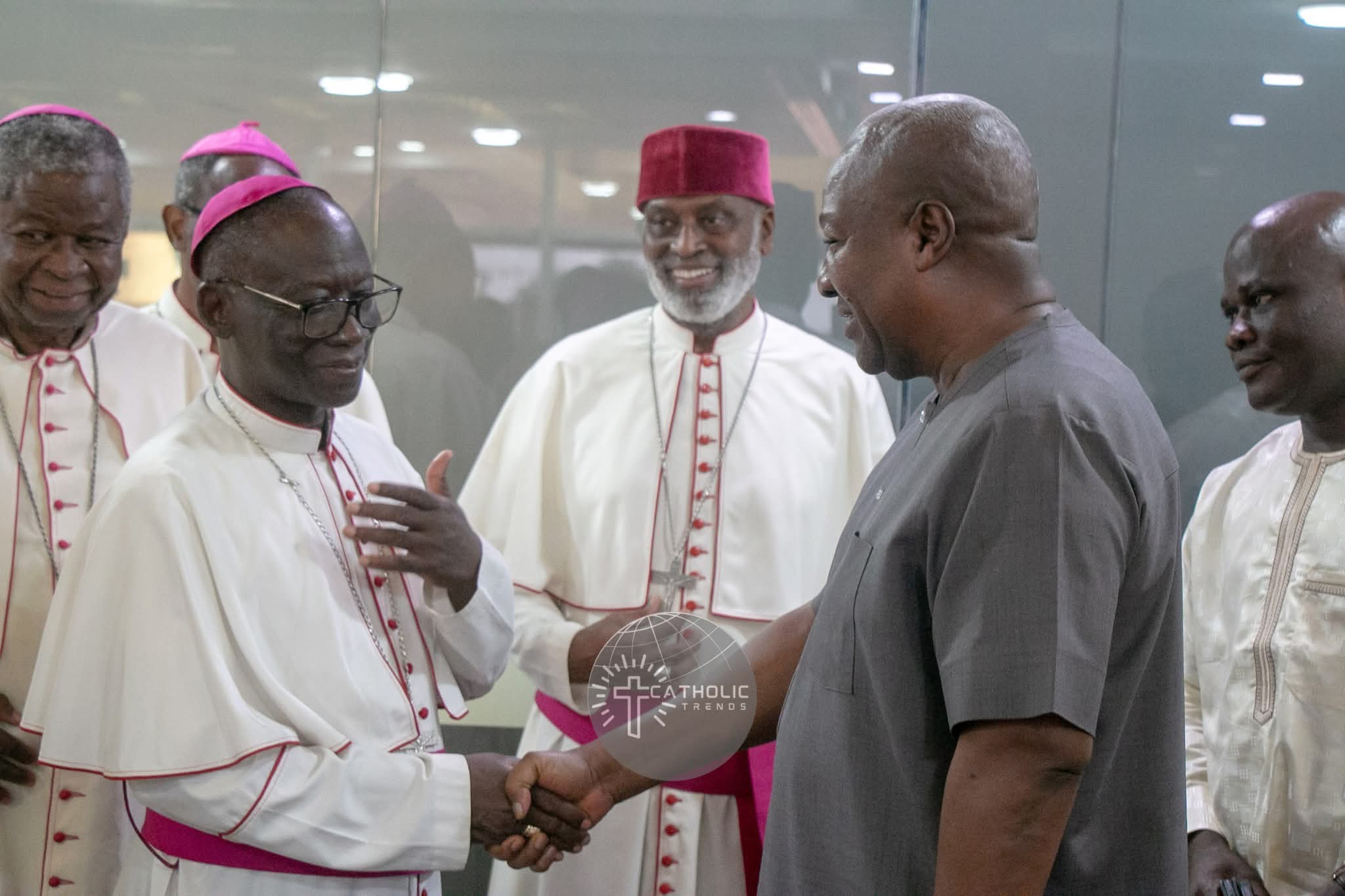 President Mahama (Right) in a handshake with Bishop Matthew Gyamfi (Left) , President of the Ghana Catholic Bishops' Conference