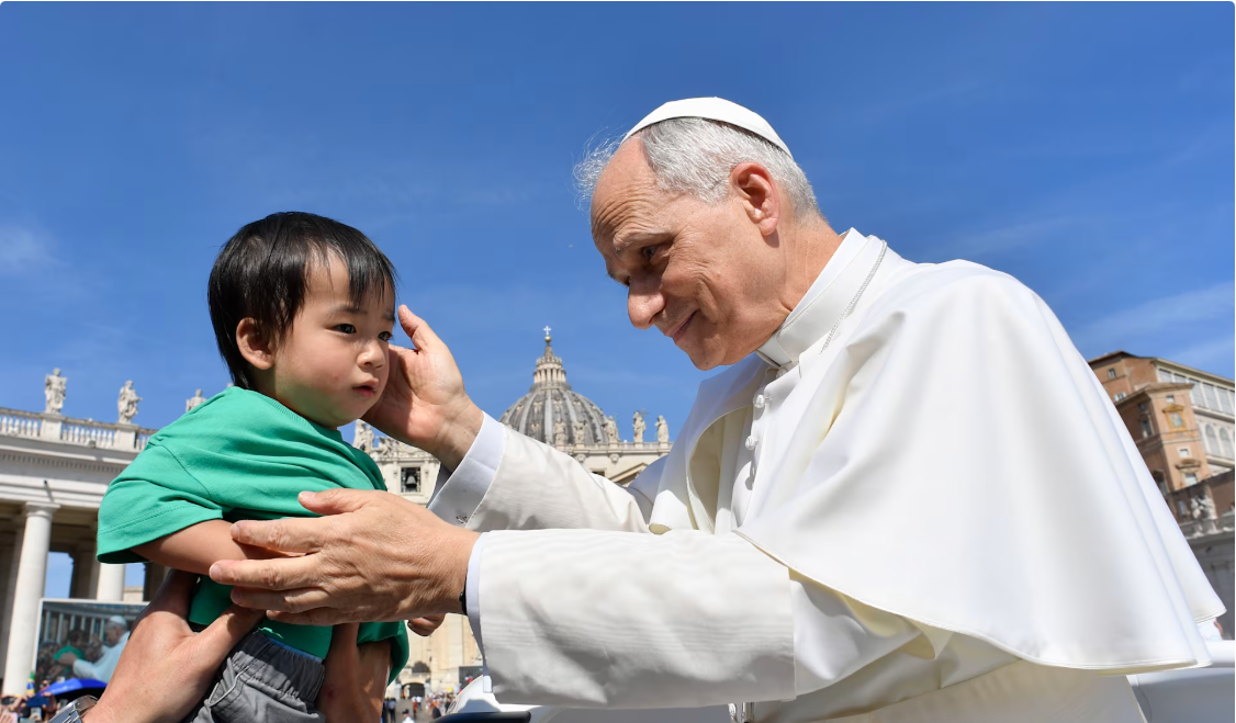 Pope Leo XIV blesses a small attendee at the general audience in St. Peter's Square on Wednesday, June 4. 2025 | Credit: Vatican Media