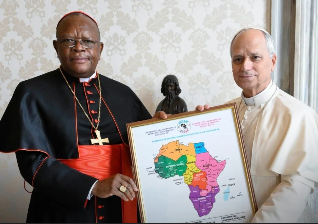 File photo of Cardinal Ambongo and Pope Leo
